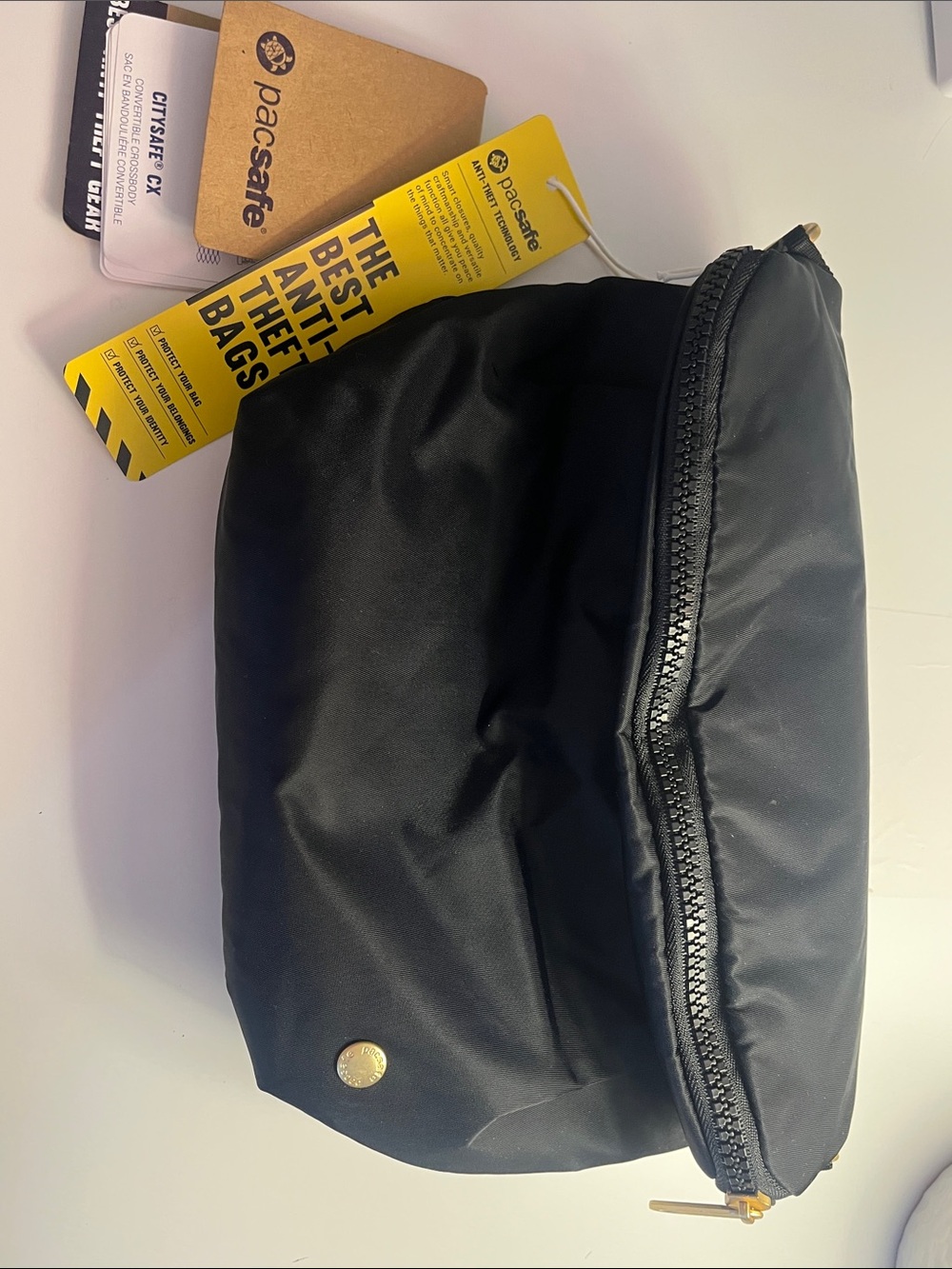 Pacsafe Black Anti-Theft Toiletry Pouch with Gold Accent